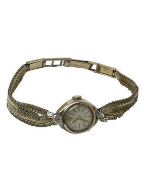 Vintage Invicta Ladies Gold Watch With Cubic Zirconia Accents